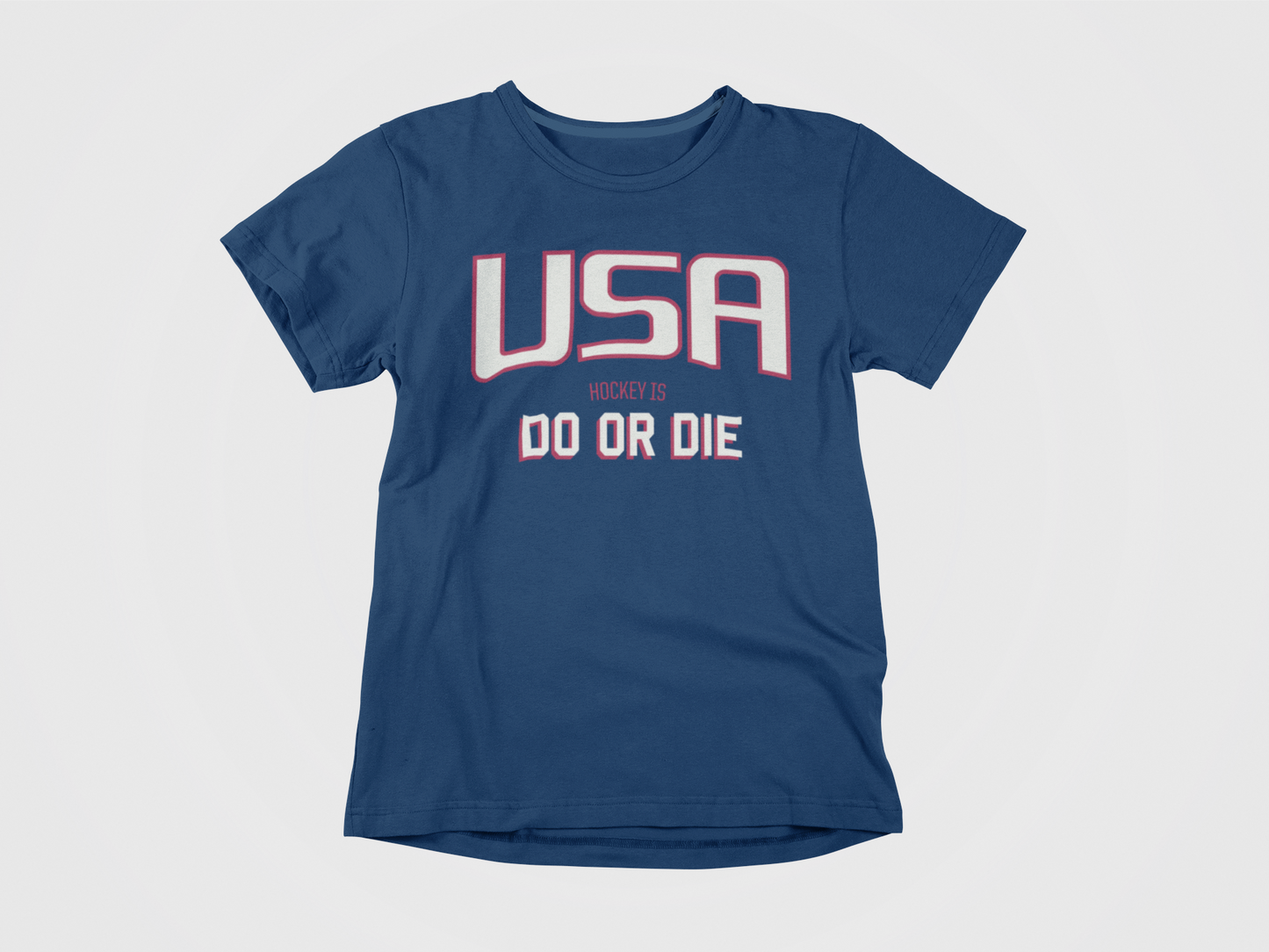 Front of Shirt, Color Navy, White lettering with red outline says USA HOCKEY IS DO OR DIE