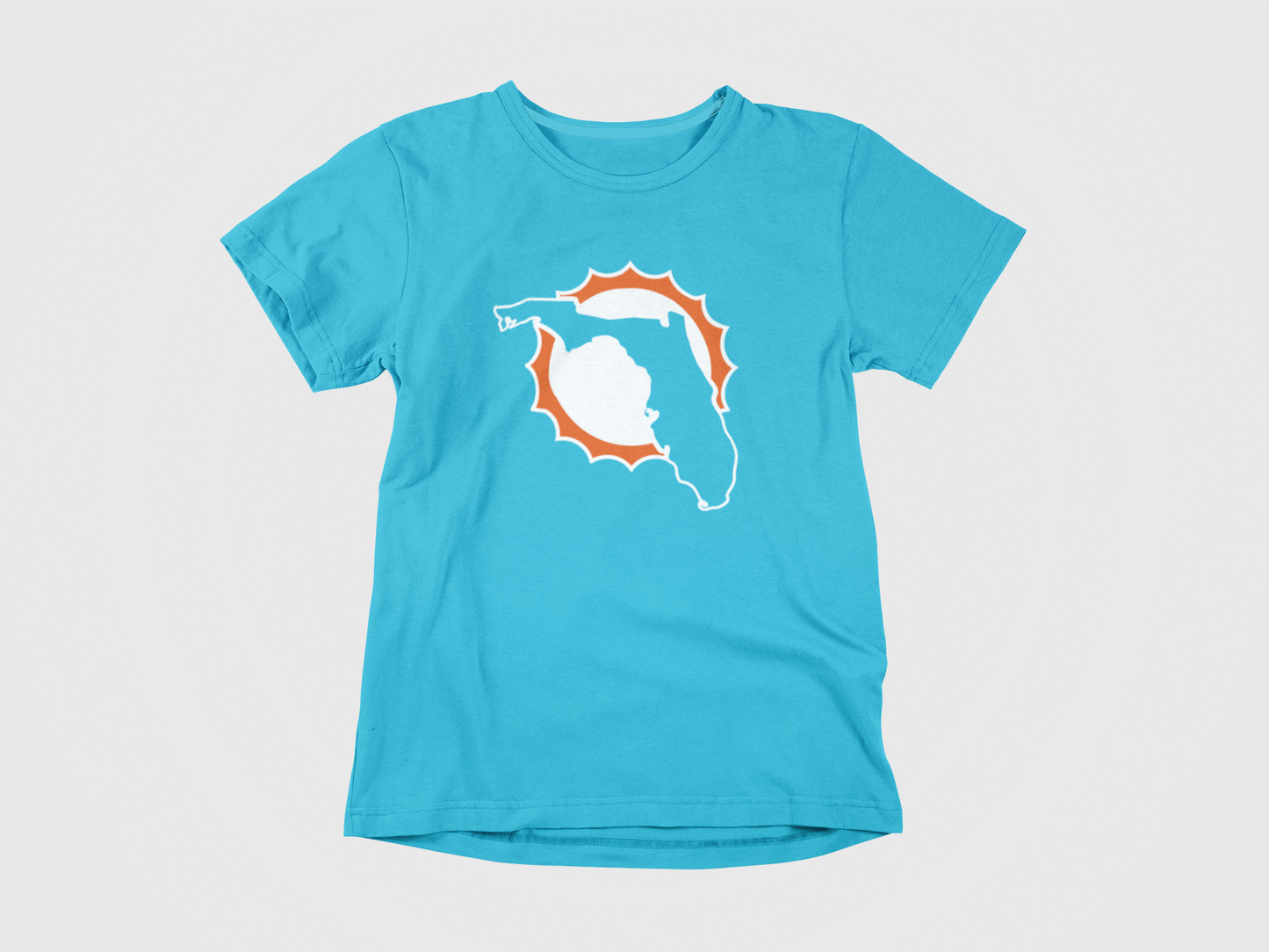 teal shirt, front of shirt, orange and white colors, florida in the sun, Miami Dolphins, fins. florida dolphins logo