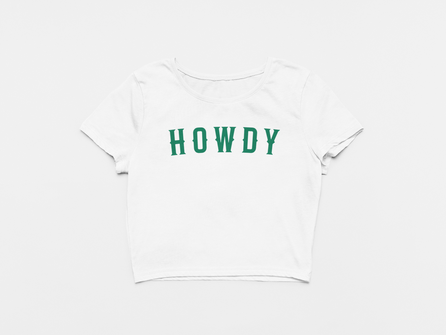 white crop top, front of crop top, howdy across the chest, green lettering, dallas stars