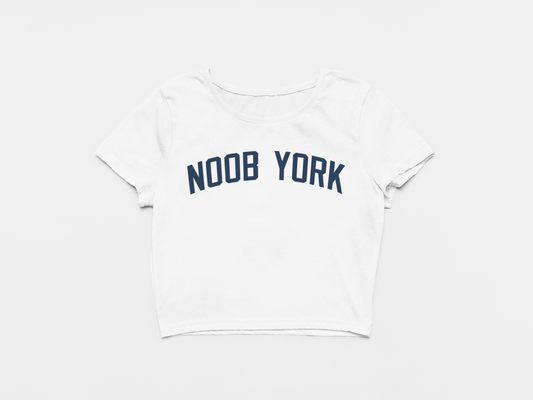 white crop top, front of crop top, navy lettering, noob york across the chest, new york yankees, yankees font, yankees