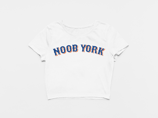 white crop top, front of crop top, blue and orange lettering, noob york across the chest, mets font, new york mets