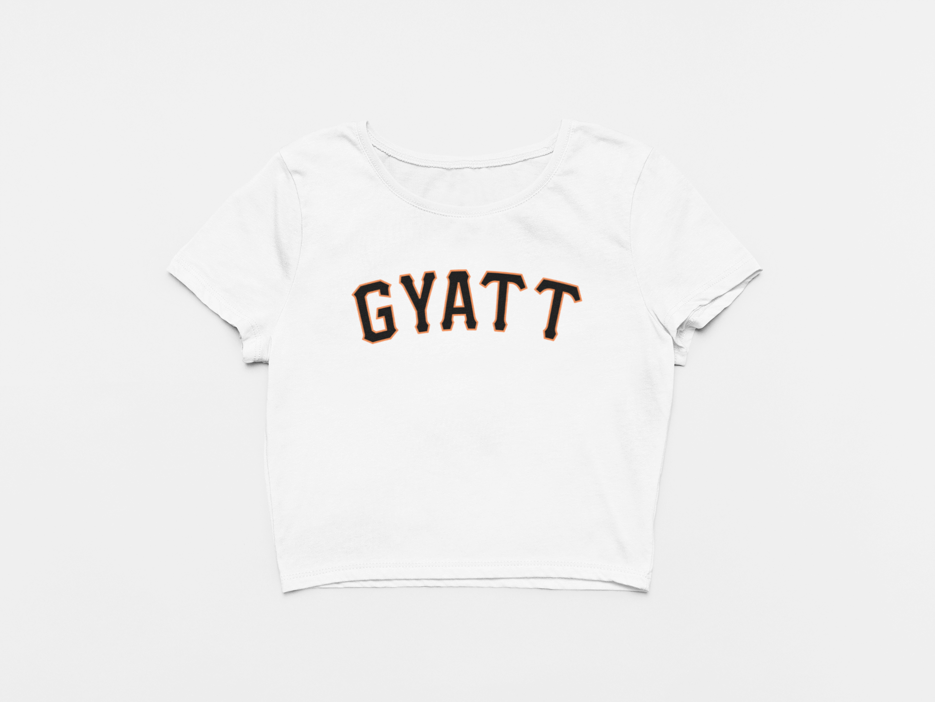 white crop top, front of crop top, gyatt across the chest, giants font, san francisco giants, black and orange lettering, giants