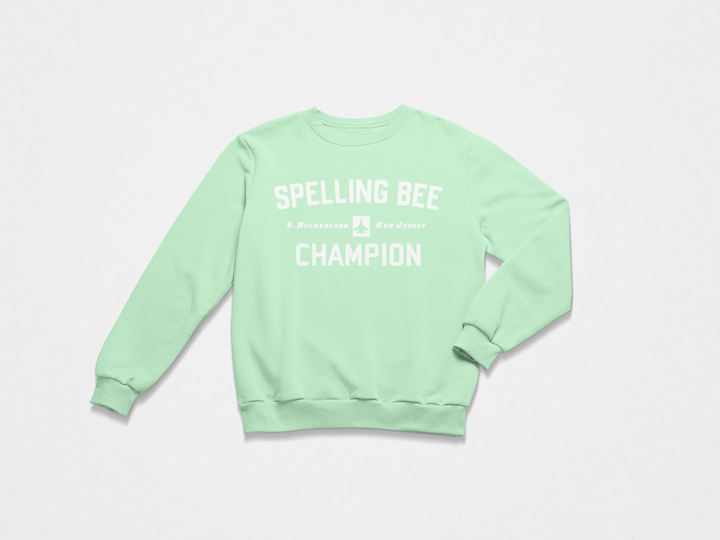 light green sweatshirt, crewneck, front of crewneck, white lettering, spelling bee champion, east rutherford new jersey, new york jets, jets, 