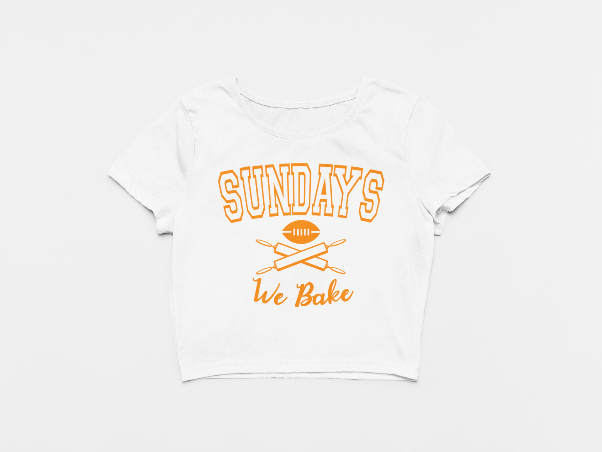 white crop top, front of crop top, creamsicle lettering, orange lettering, sundays we bake, baker mayfield, football and rolling pins, tampa bay buccaneers, bucs